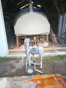 hull prep continues under coat spray machine 1